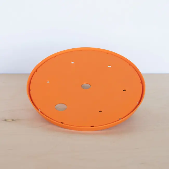 Soil saving insert. Circle disk fits inside a planter and reduces the amount of soil needed.